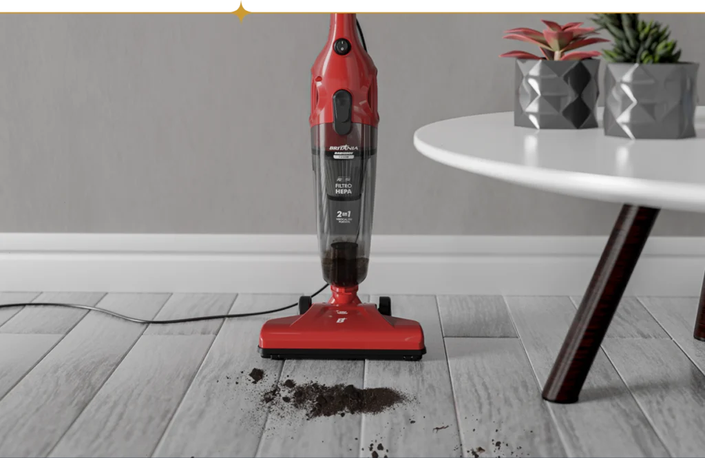 Uma pessoa frustrada olhando para um aspirador vertical quebrado no saldão, cercado por peças soltas e ferramentas.